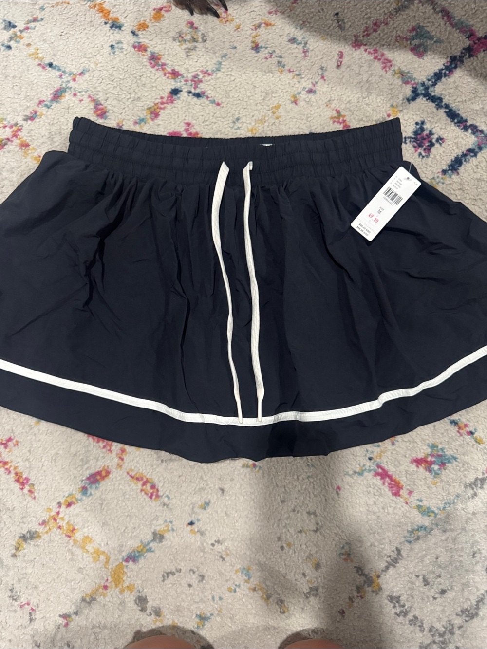Women's black/white Circle Skort with White Trim and Drawstring Waist